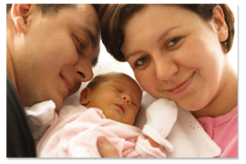 Parents with infant photo