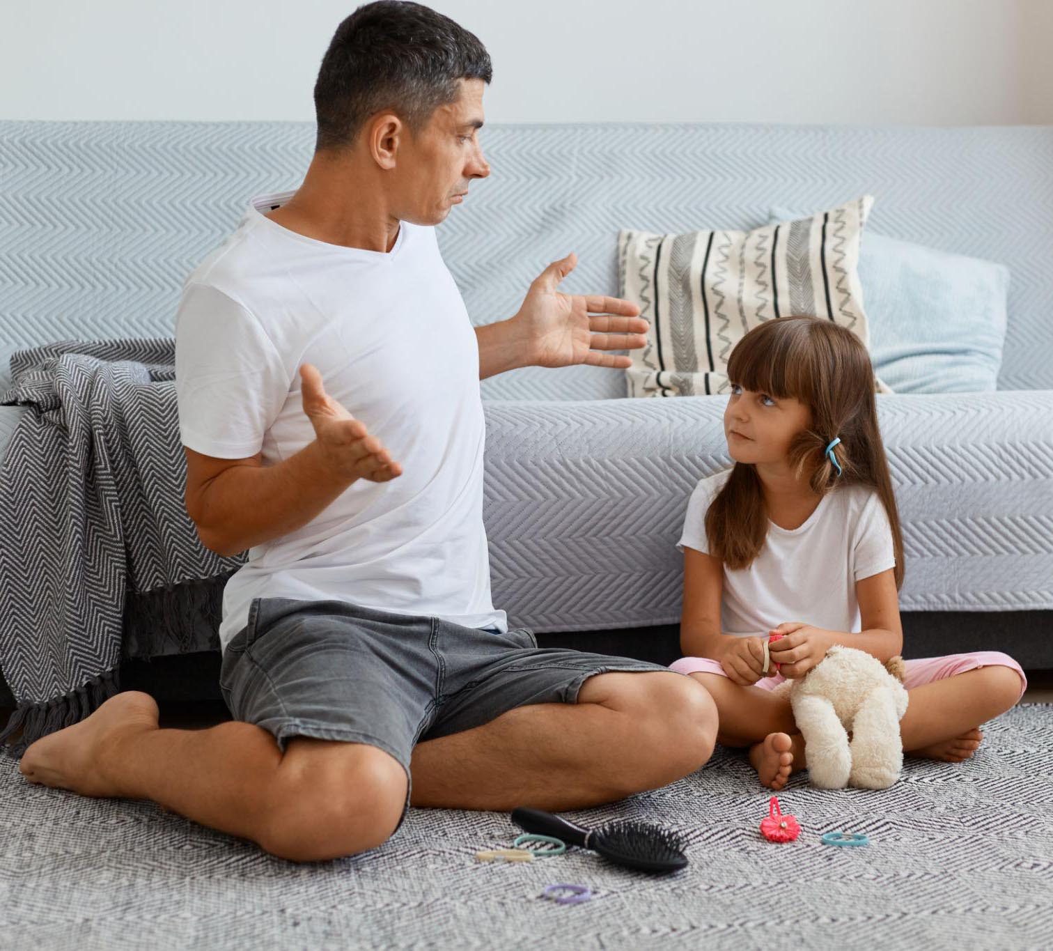 Calm parent talking to child