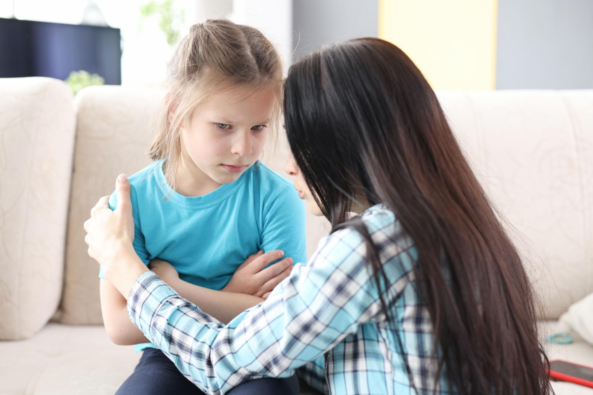 Parent calmly setting a boundary